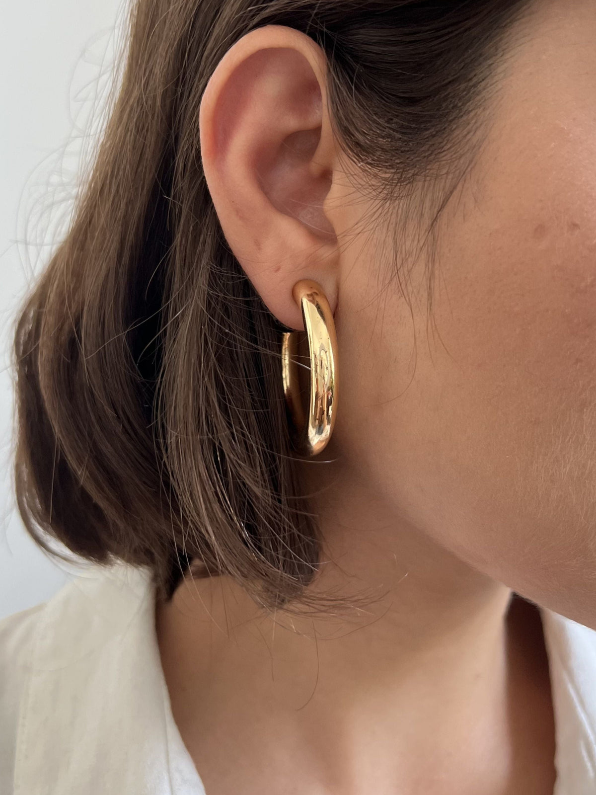 Argola Folheada a Ouro 18K Tubo Liso M